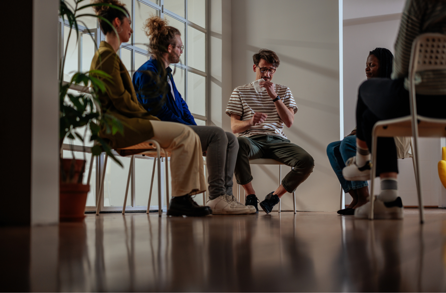 Group therapy session at California Detox & Recovery Center, where clients share experiences and receive support in addiction treatment.