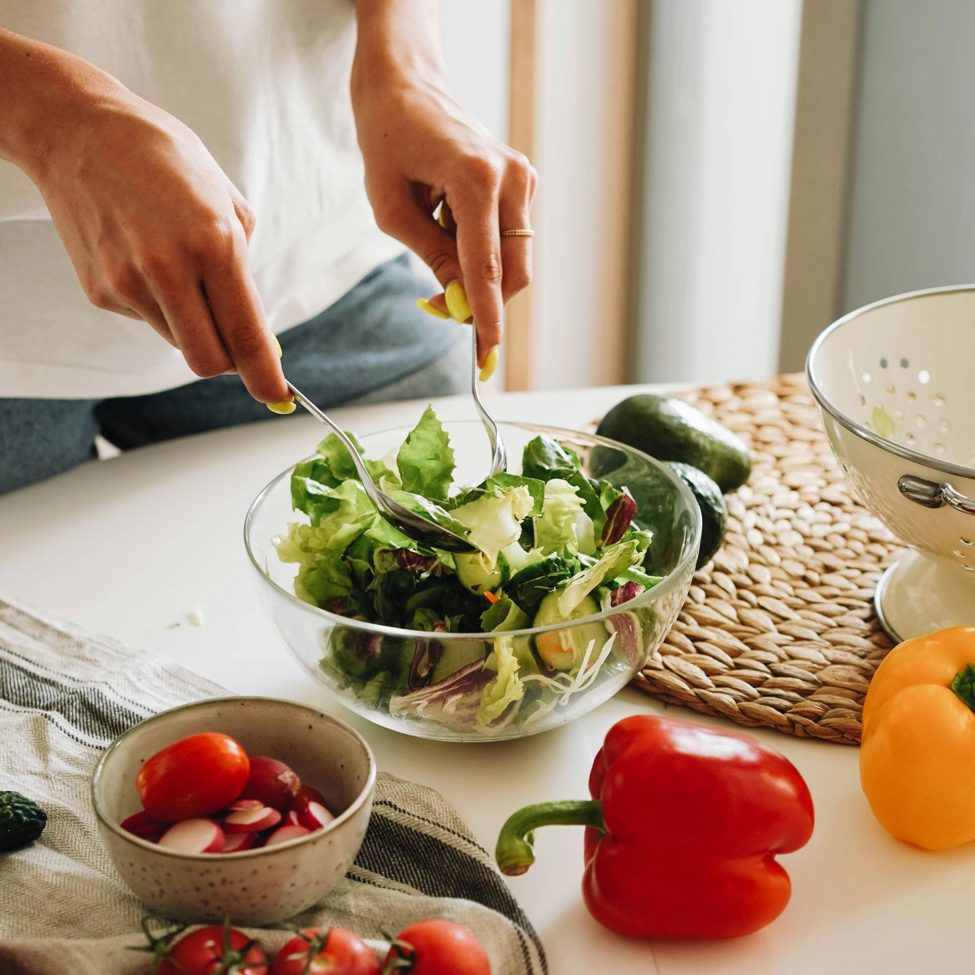 Preparing a fresh vegetable salad as part of healthy nutrition at California Detox & Recovery Center’s addiction treatment programs.