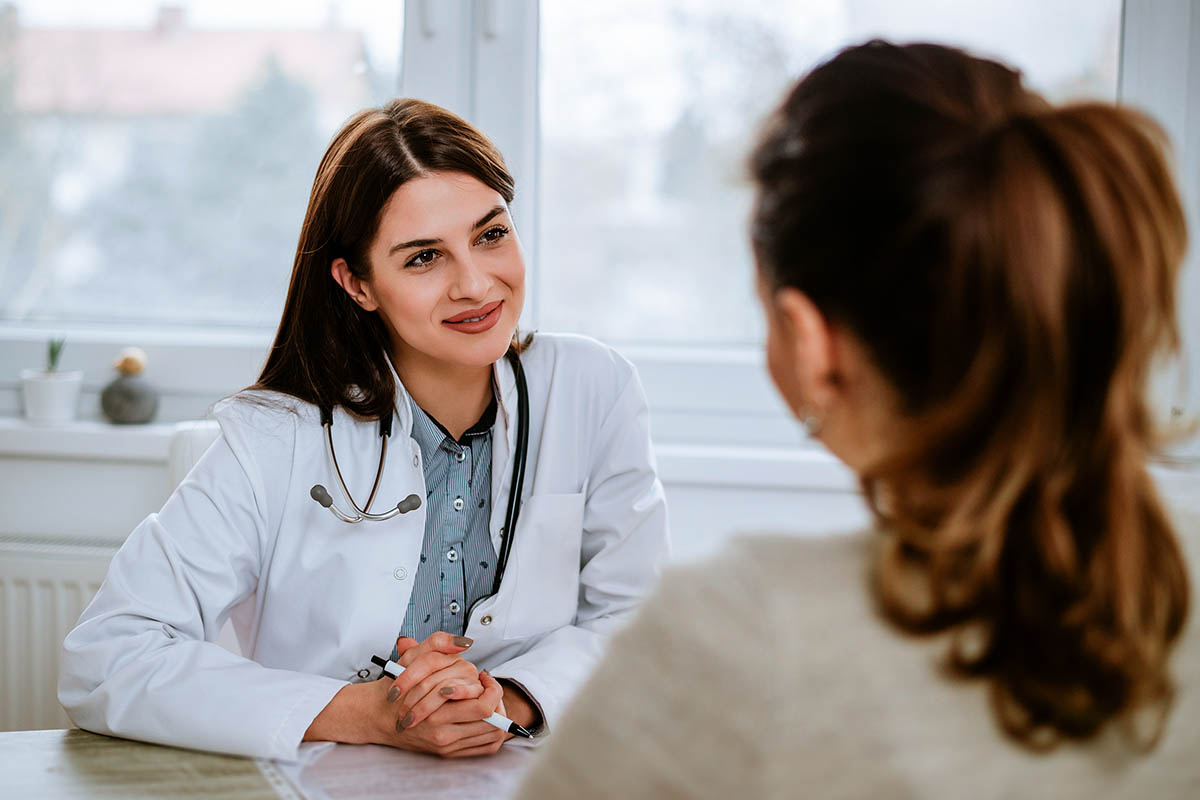 Doctor speaking with patient at California Detox & Recovery Center, providing personalized addiction treatment and recovery support in a professional, caring environment.