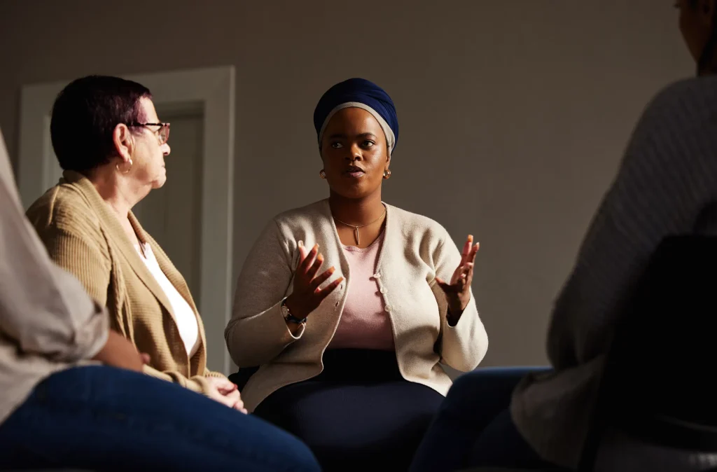 Woman opening up during a group therapy session at California Detox & Recovery Center in Los Angeles.