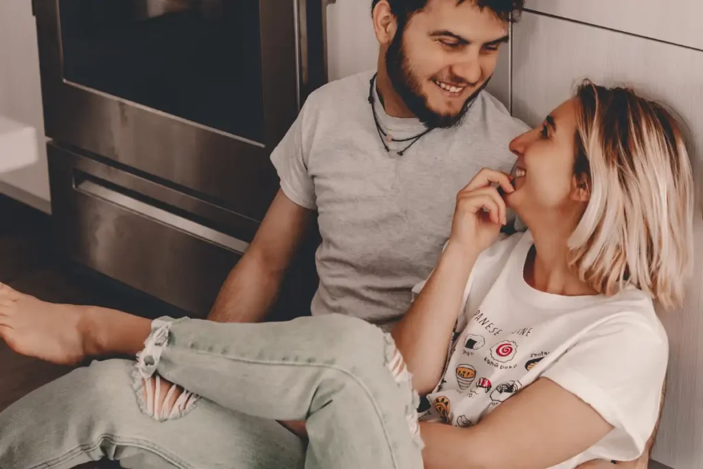 Couple Talking While Sitting on the Floor